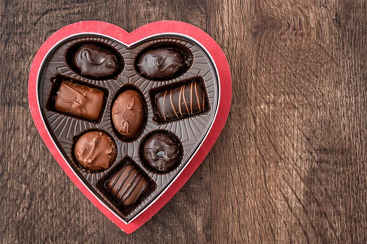 A heart shaped box with assorted chocolates